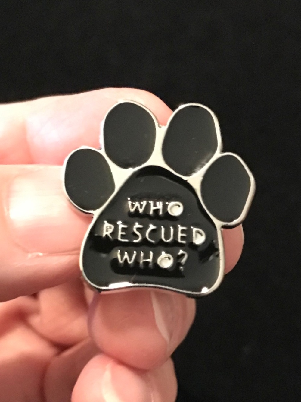 NWOT black kitty/dog paw print “who rescued who?” pin (pins: 1/$12, 2/$20)